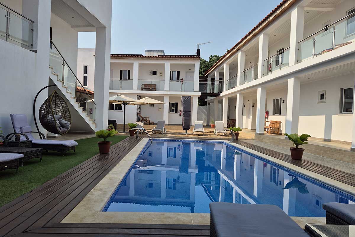 Rooms and swimming pool at Hotel Kenito, Sao Tome City